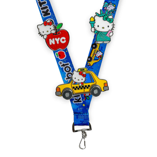 Hello Kitty NYC deluxe pins and lanyard set by Sanrio, limited edition 2025 con exclusive featuring colorful Hello Kitty designs.