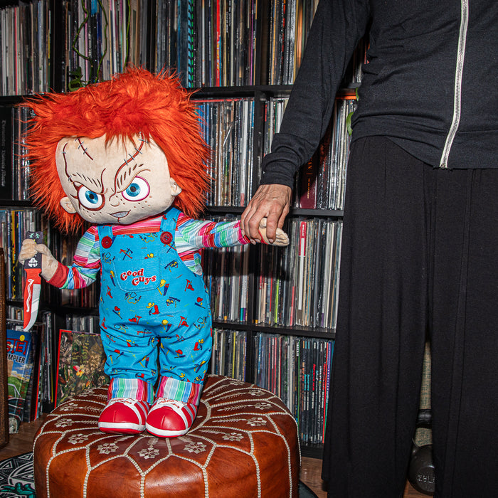 Life-size plush of Evil Chucky from Bride of Chucky, 30-inch plush toy by Chucky, featuring detailed doll design.