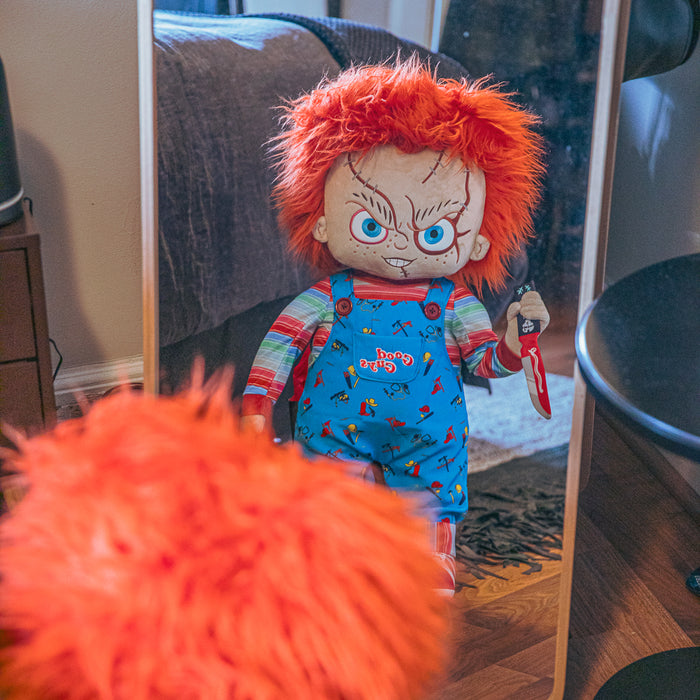 Life-size plush of Evil Chucky from Bride of Chucky, 30-inch plush toy by Chucky featuring detailed horror character design.