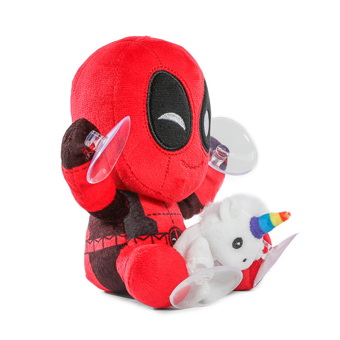 Deadpool with unicorn plush window clinger featuring vibrant colors and cartoon design, perfect for decorating windows.