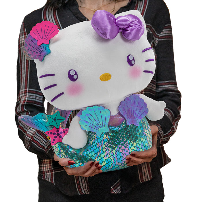 Hello Kitty purple mermaid plush toy by Sanrio, featuring soft fabric and detailed mermaid fins.