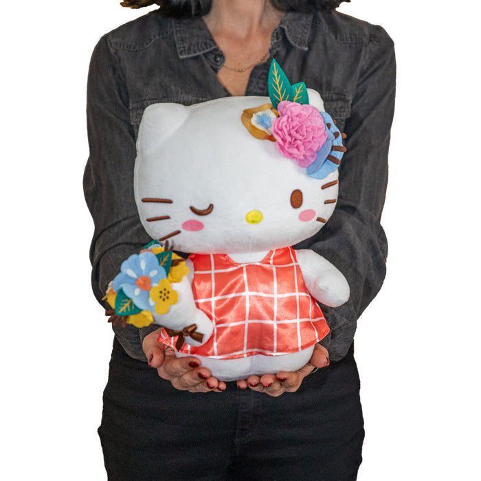 Sanrio Hello Kitty spring-themed plush toy, featuring soft fabric and cheerful design perfect for cuddling.