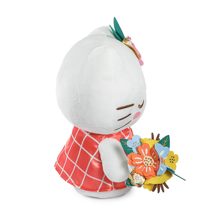 Sanrio Hello Kitty® Springtime plush toy with pink bow and floral design, soft and cuddly for children.