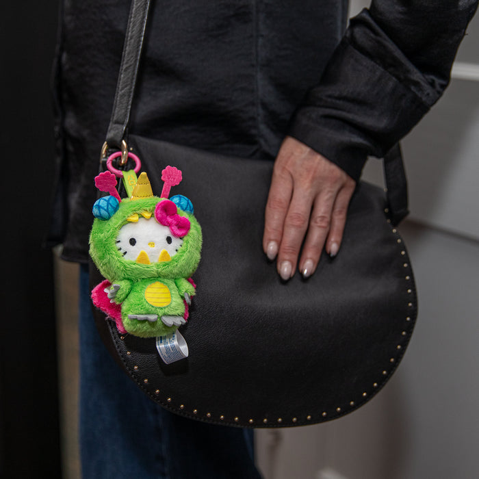 Hello Kitty Unibee Kaiju plush charm by Sanrio featuring a cute green plush character from the Hello Kitty SDCC debut collection.