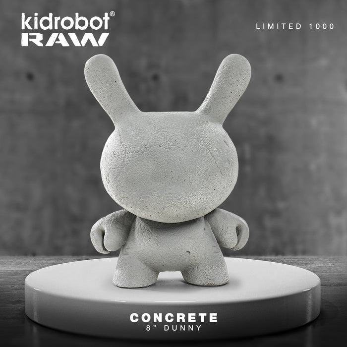 8-inch Kidrobot RAW Concrete Dunny figure, limited edition collectible art toy with a textured concrete finish.