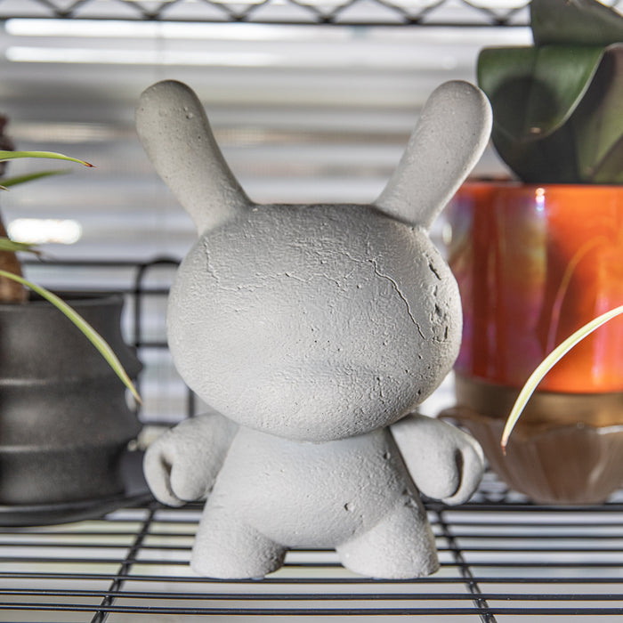 Kidrobot RAW 8-inch Concrete Dunny figure, limited edition collectible toy with a textured concrete finish and unique design.