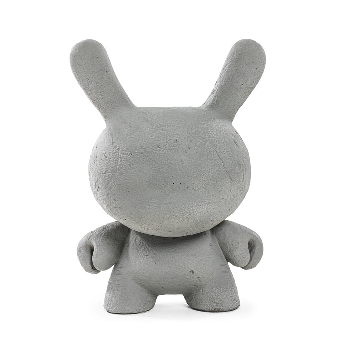 Kidrobot RAW 8-inch Concrete Dunny collectible toy with a minimalist, textured concrete finish and distinct cartoon-style design.