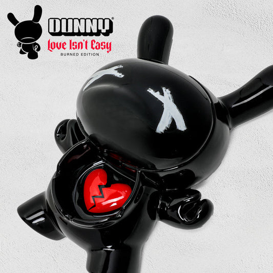 Kidrobot L.I.E. Dunny ceramic ashtray in Burned Edition, featuring a stylized Dunny design with a textured, burned finish.