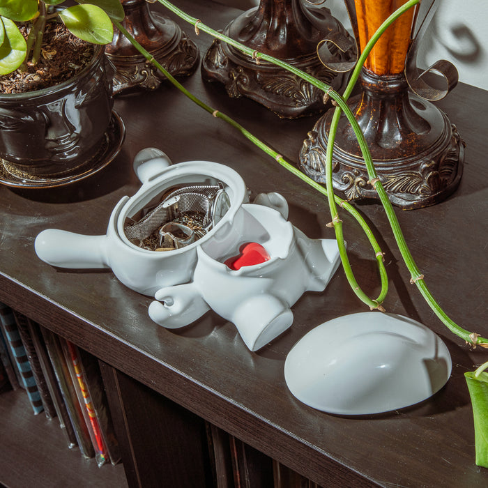 Kidrobot L.I.E. Dunny ceramic ashtray, PURE Edition featuring a heartstruck design with a stylized Dunny figure.