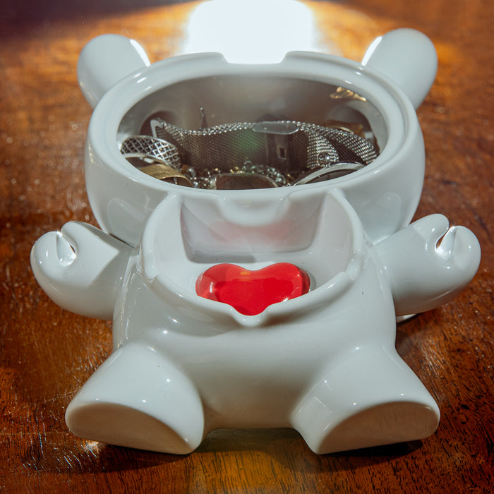Kidrobot L.I.E. Dunny ceramic ashtray, PURE Edition featuring a love-themed design with a heart motif, made of ceramic.
