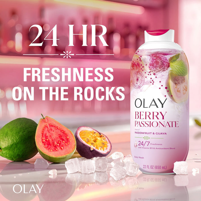 Olay Berry Passionate Body Wash on bar counter top with cut fruit. 24 Hour freshness on the rocks