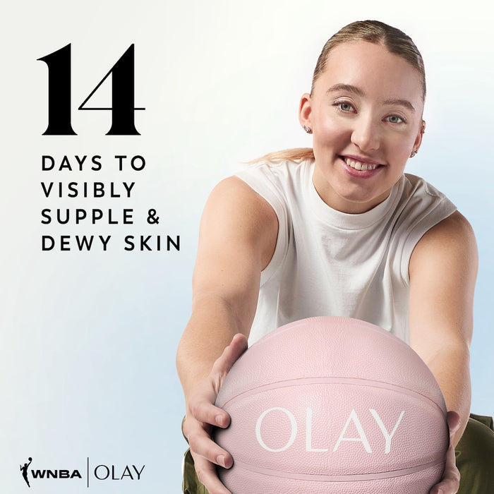 WNBA Player Paige Bueckers posing holidng a basketball smiling. 14 days to visibly supple and dewy skin
