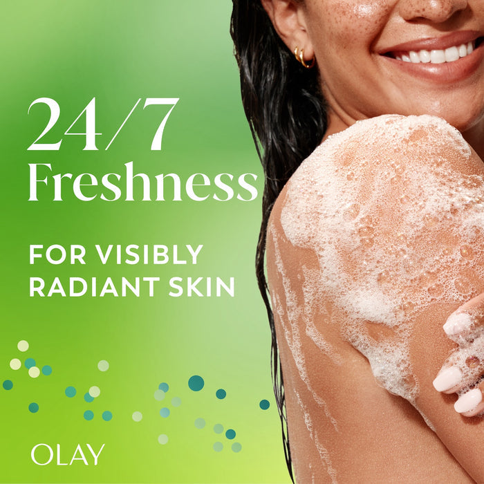 Model posing lathering body wash on arm. 24/7 Freshness for visibly radiant skin