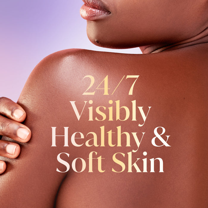 Model posing back facing. 24/7 visibly healtyh and soft skin