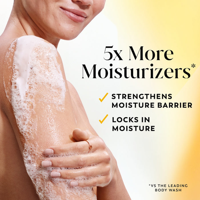 Model posing lathering arm with body wash. 5x more moisturizers* Strengthens moisture barrier. Locks in moisture. *vs the leading body wash.