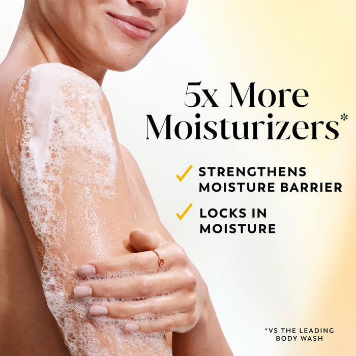 Model posing lathering body wash on arm. 5x more moisturizers*. Strengthens moisture barrier, locks in moisture. *Vs the leading body wash.