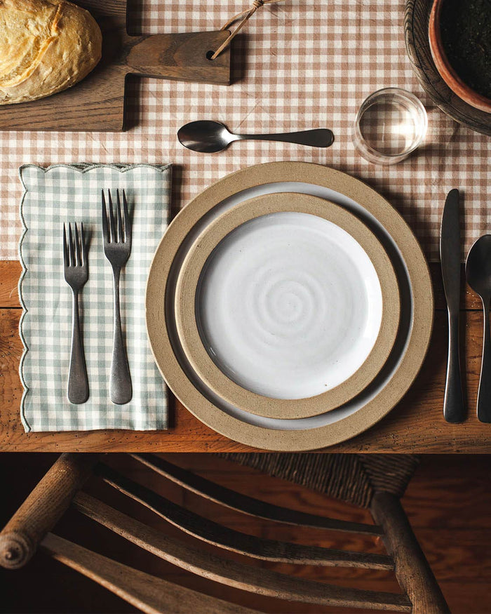Petite Gingham Scalloped Cotton Napkins — gingham napkin at a place setting; Farmhouse Pottery