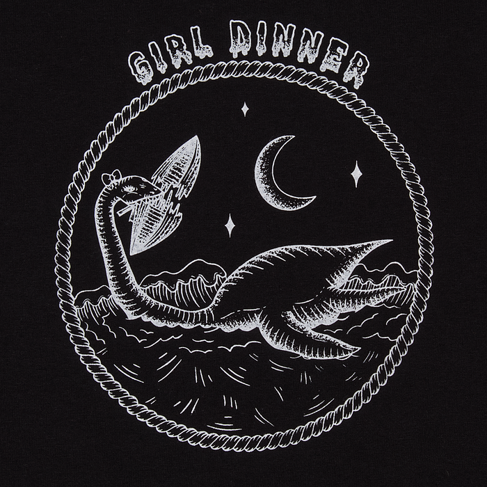 Close-up of Plesia Girl Dinner screen print detail, black shirt
