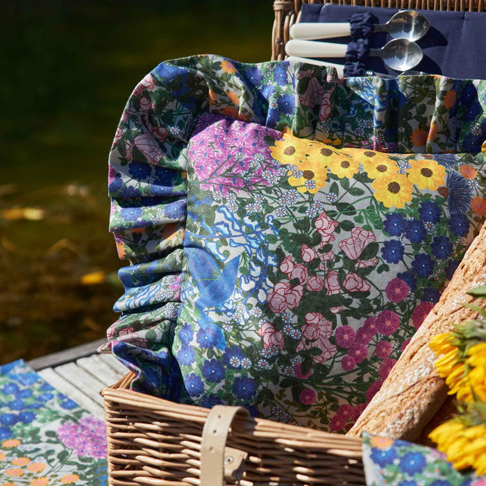 Close-up of the Pré Fleuri Organic Cotton Ruffled Pillow Cover print