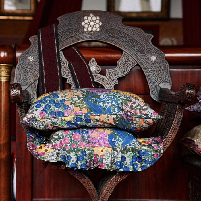 Styled view of the Pré Fleuri Organic Cotton Square Pillow Cover