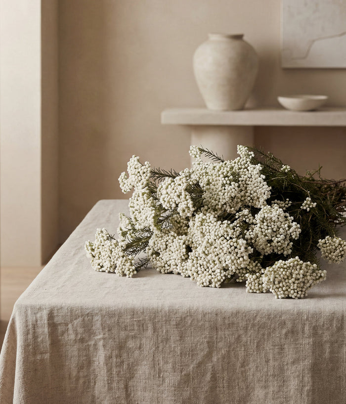 Preserved White Rice Flower Bunch — in a styled setting