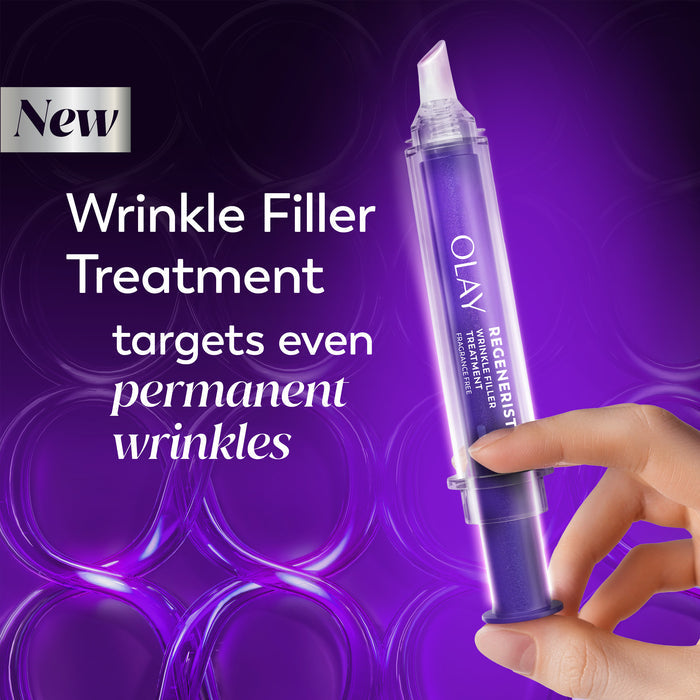 A hand holding a purple Olay Regenerist Wrinkle Filler treatment syringe against a purple background with text advertising wrinkle treatment.