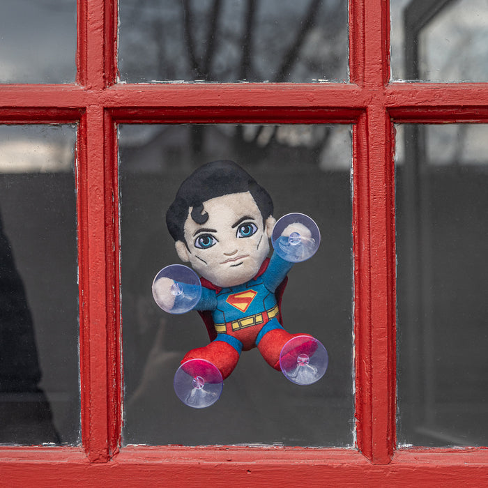 Superman plush window clinger from DC Comics featuring a detailed Superman figure for decoration or display.