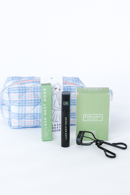 Eyelash extension kit with tools and packaging on a white background