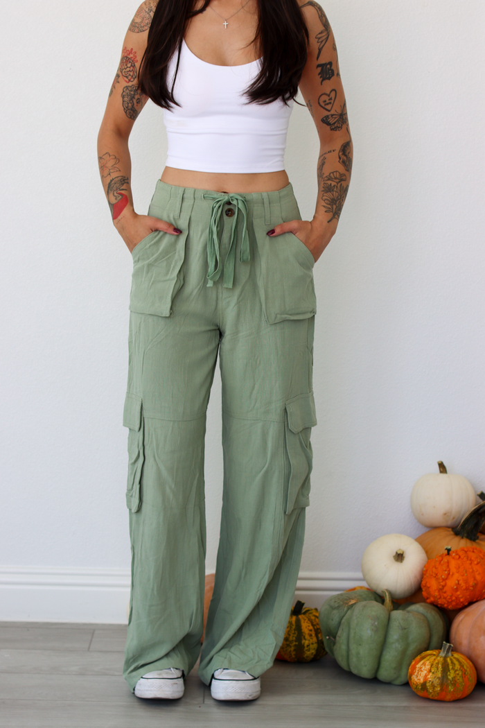 Woman wearing green wide leg cargo pants