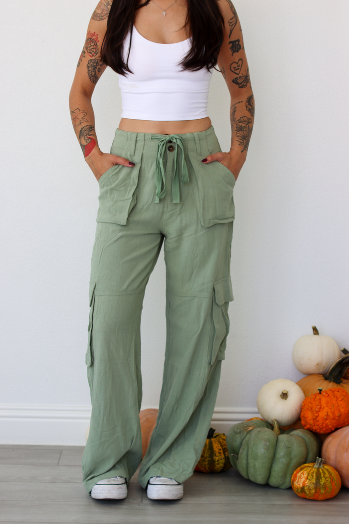 Woman wearing green wide leg cargo pants